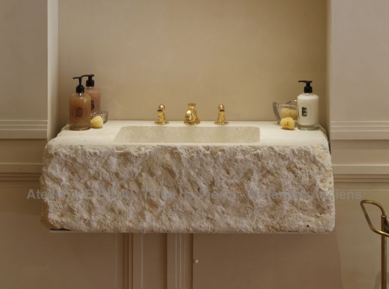Customized sinks hand-carved in natural French limestone by the artisan stone cutter Alain BIDAL