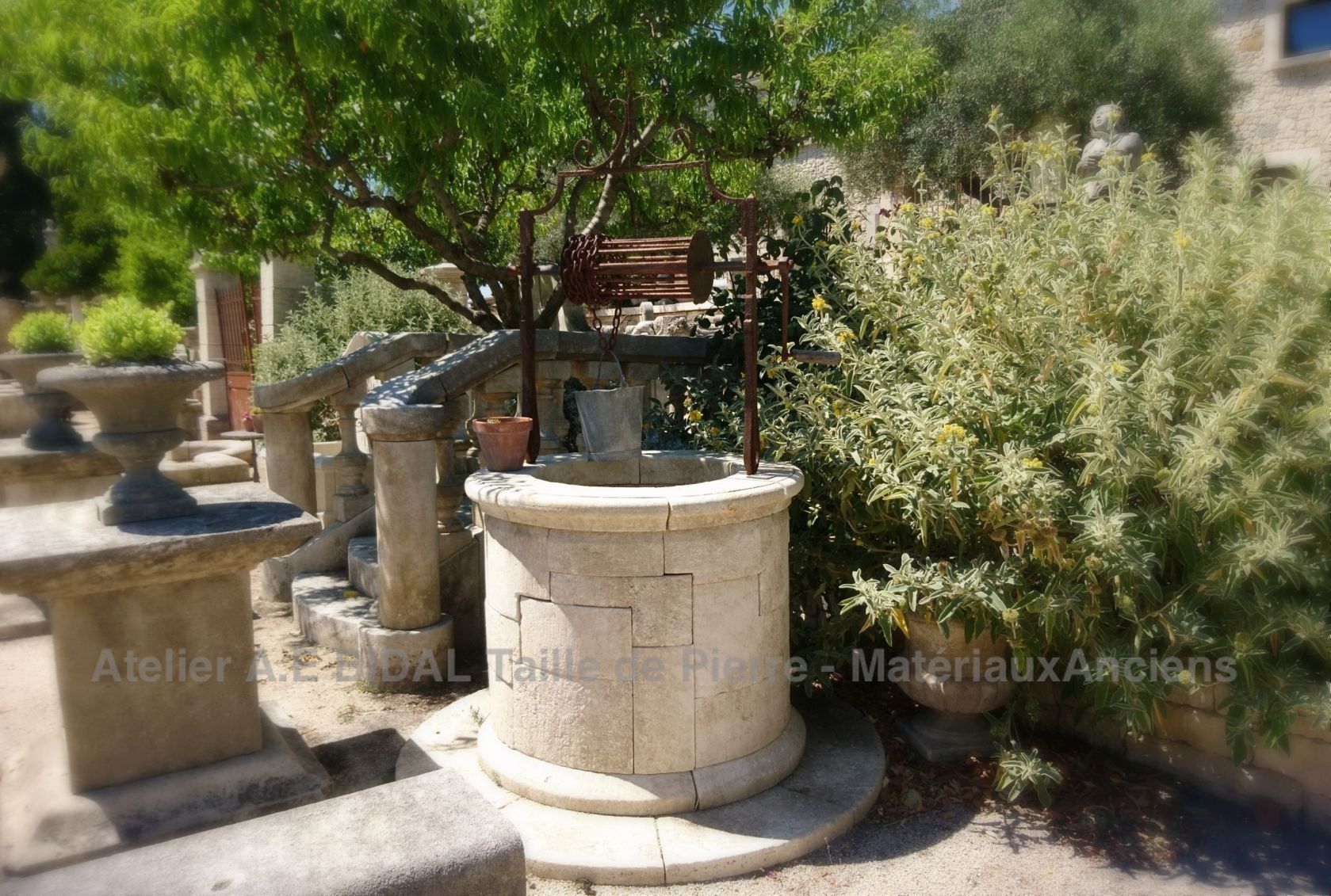 Here is a beautiful natural stone well made by Alain Bidal in his Atelier in Isle-sur-la-Sorgue.