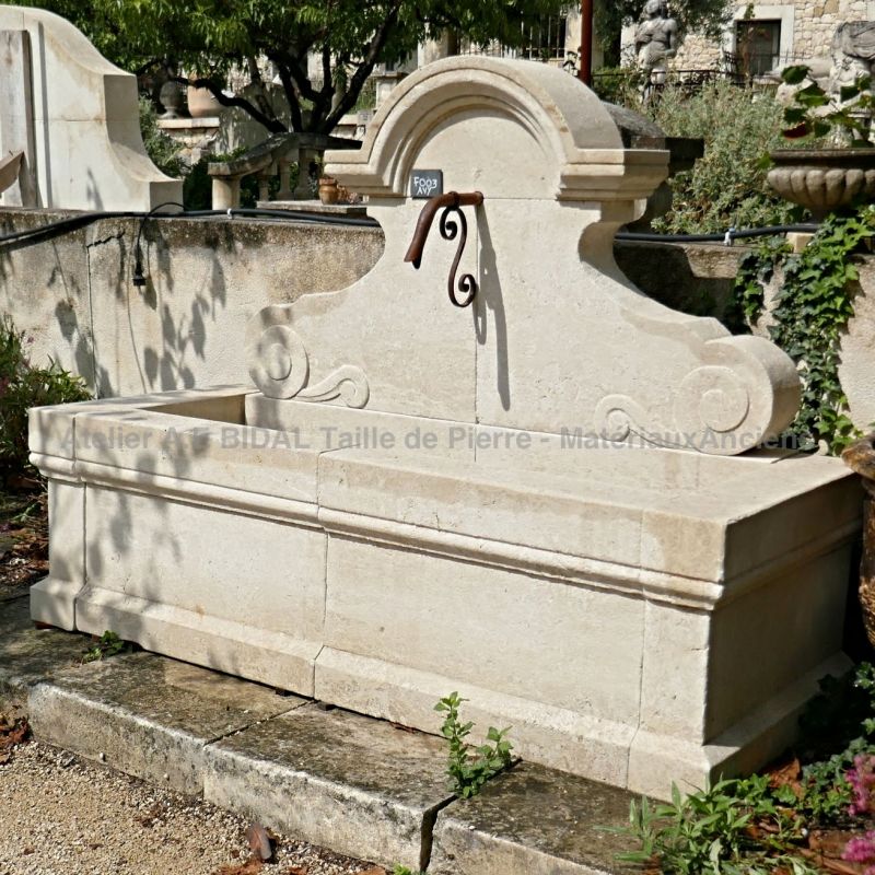 Garden fountain carved in limestone and handcrafted in Provence.