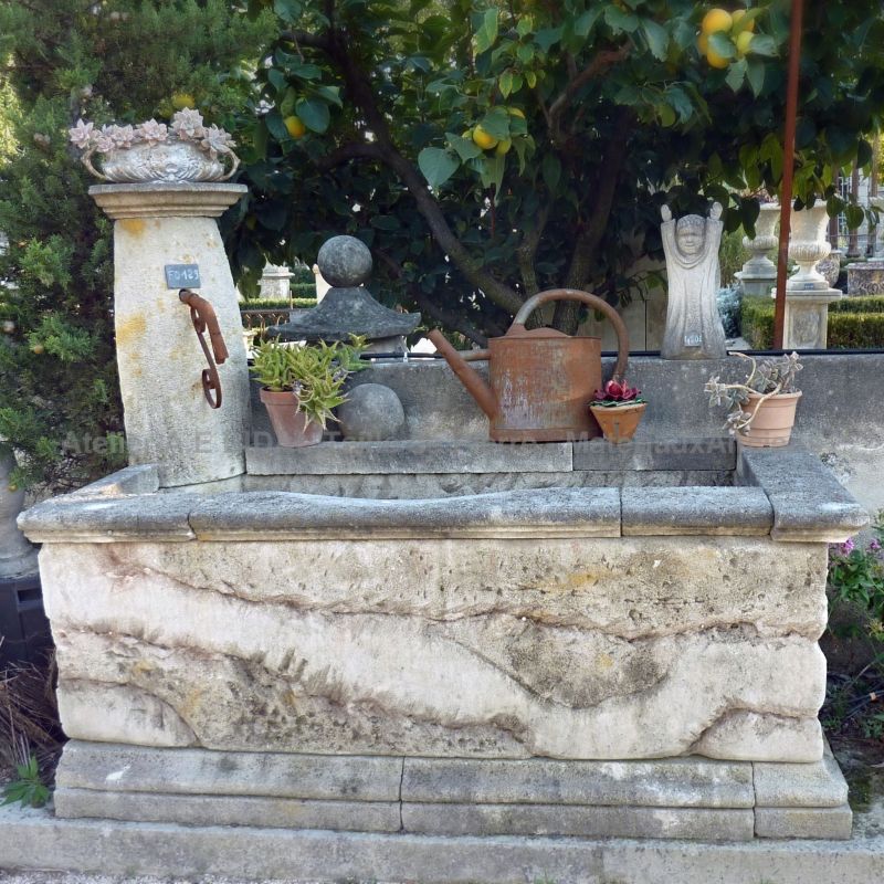 Nice yet rustic-looking fountain in stone for outdoor use
