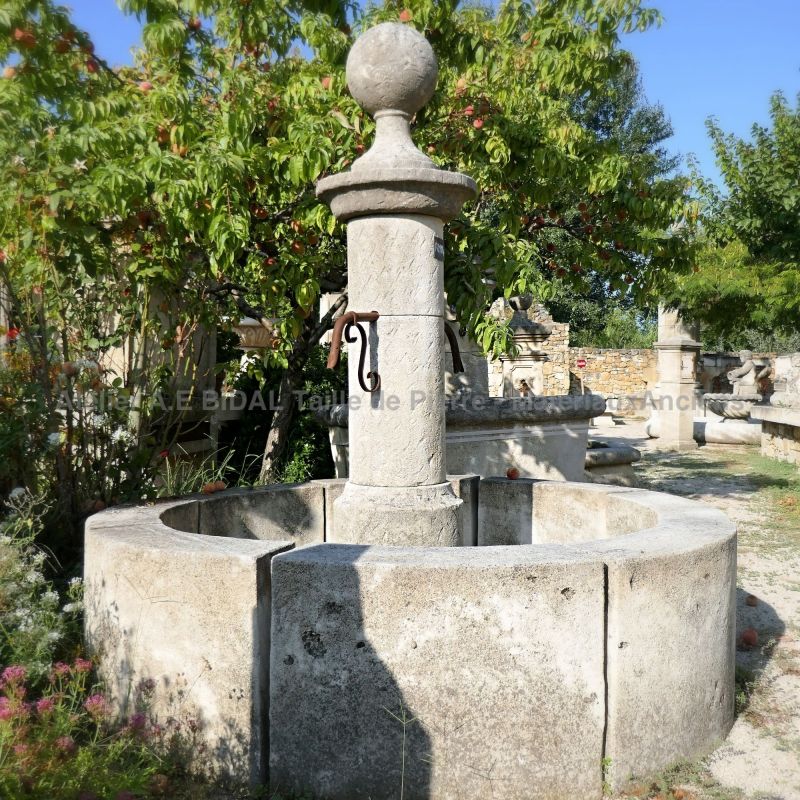 Garden water fountain crafted in natural stone - Central fountain for sale at Alain Bidal (Provence)