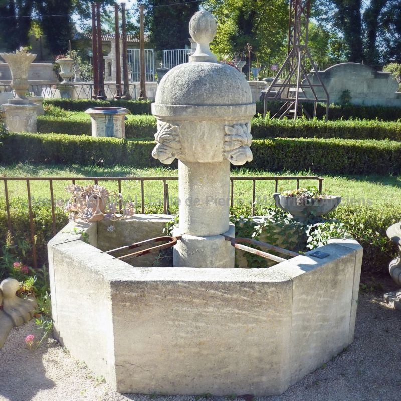 Gothic fountain crafted in Provence by the stone cutting atelier Alain Bidal