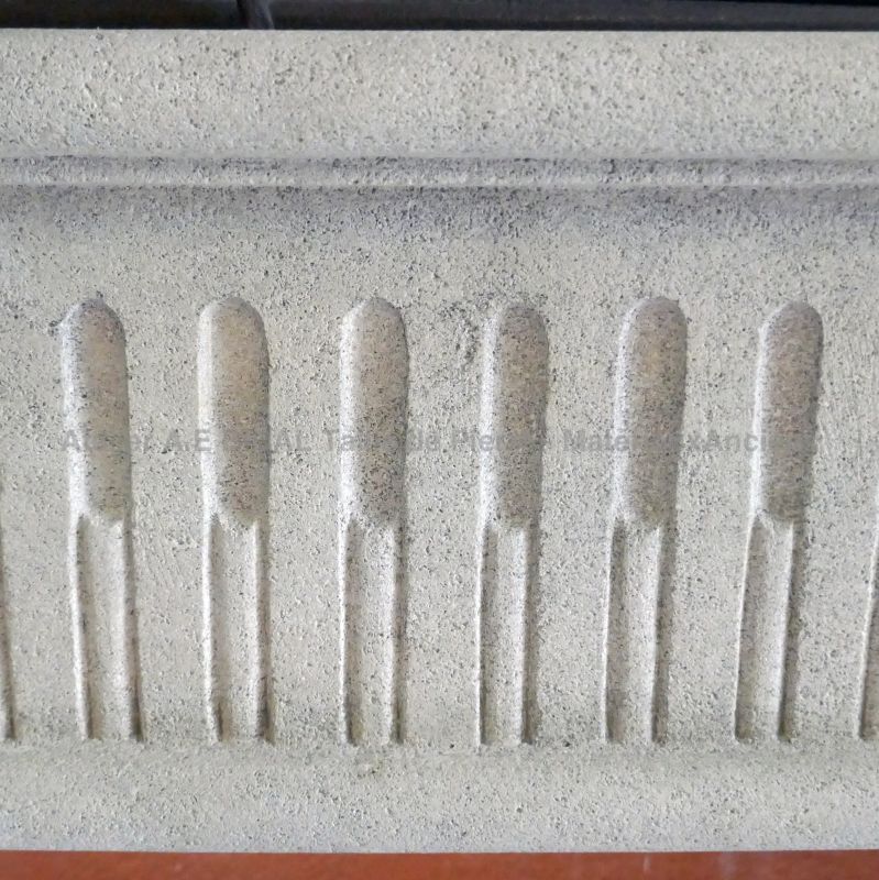 Detailed picture of the hand-sculpted details on the lintel of our mantel in stone - Atelier Alain BIDAL (Provence)