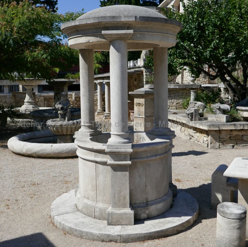 Puits de jardin en pierre de taille par le tailleur de pierre de l'Atelier Alain BIDAL, Provence.