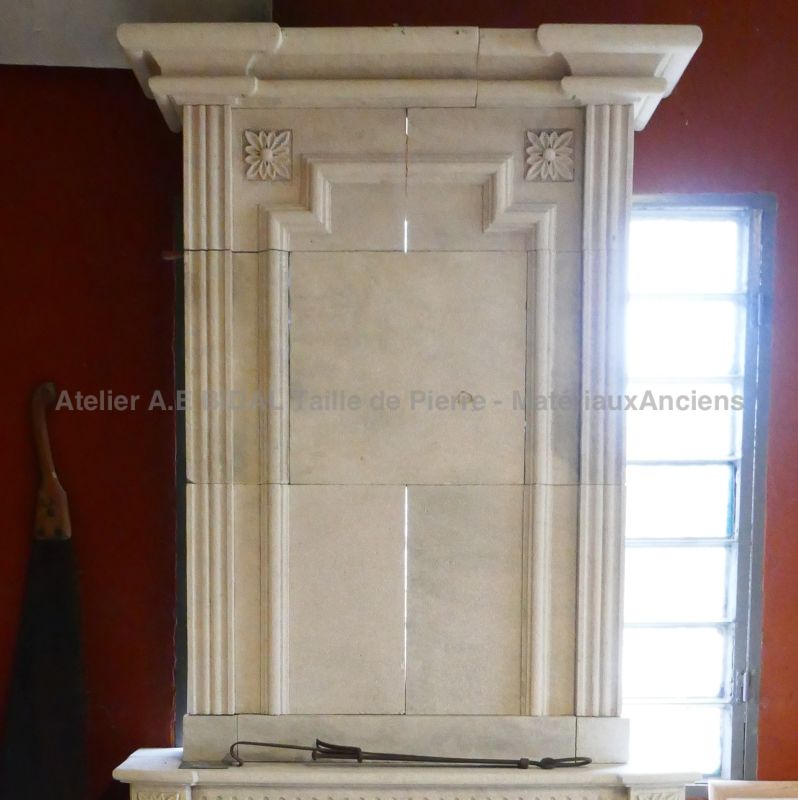 Fireplace carved in a stone quarried in France - Louis XVI stone mantlepiece by the Atelier Alain BIDAL (Provence)