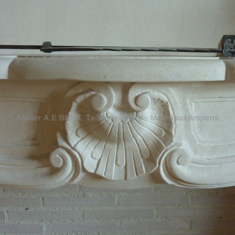 A French Regency mantelpiece in stone for a lovely home design by Atelier Alain BIDAL (Provence)