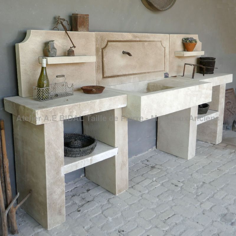 Traditional summer kitchen in stone carved by the stone cutter Alain Bidal, Provence