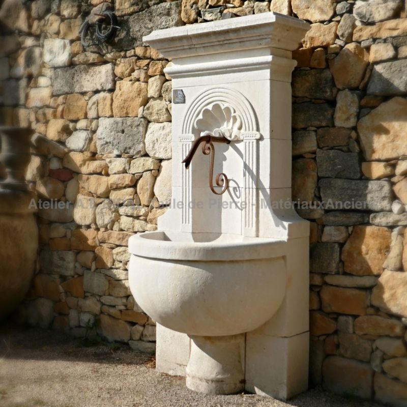 Beautiful wall fountain finely carved by our stone mason Alain BIDAL, Provence.