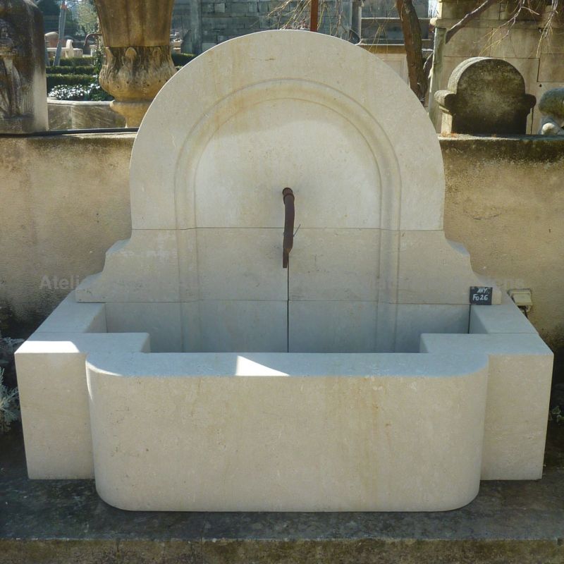 Beautiful wall fountain for landscaping of the garden by the stonemason Alain Bidal in Provence.