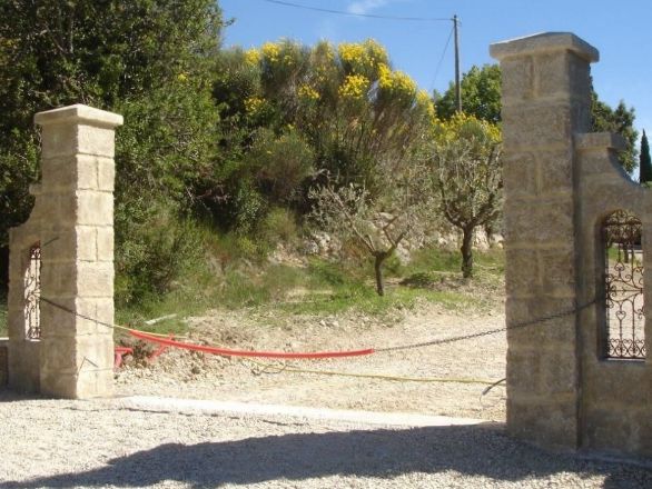A beautiful pair of stone pillars carved in Avy Stone
