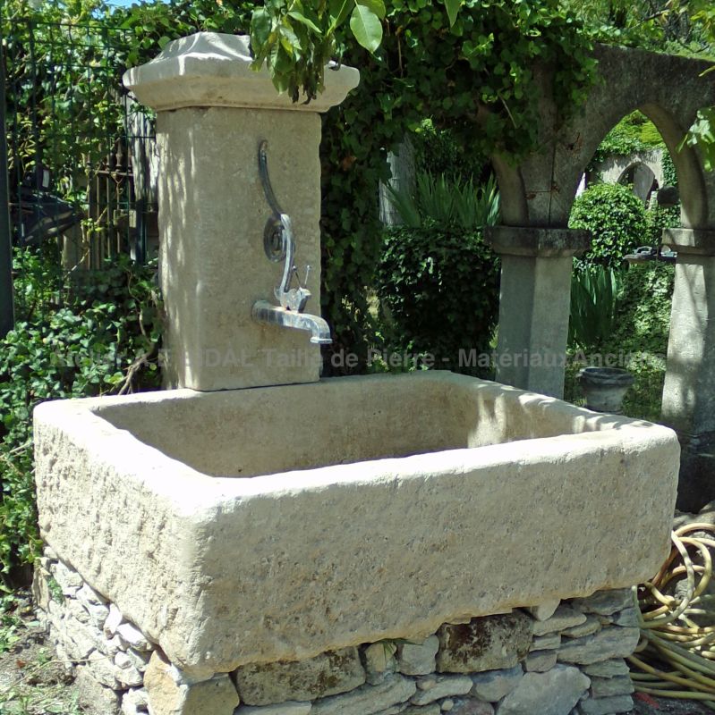 Garden wall fountain crafted from frost resistant limestone by Alain BIDAL, Provence.