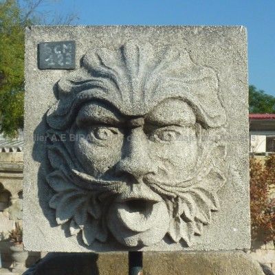 Water outlet in carved limestone by the stone cutter of Provence Alain BIDAL