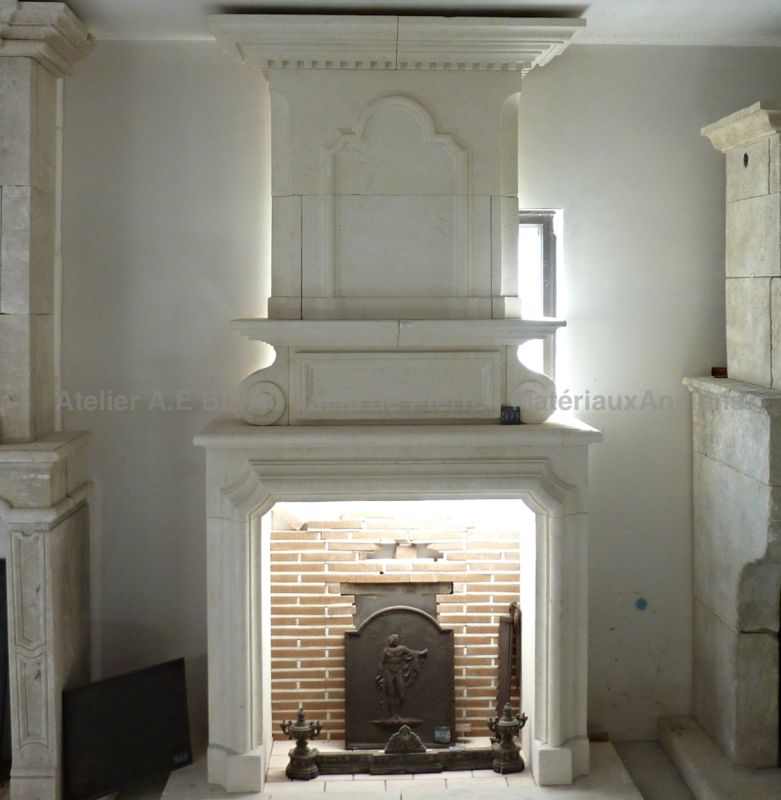 Classic French Louis XIII mantel with overmantel in carved limestone - Atelier Alain BIDAL (Provence)