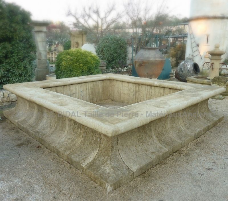 Exceptional garden pond by the stone mason Alain Bidal in Provence.