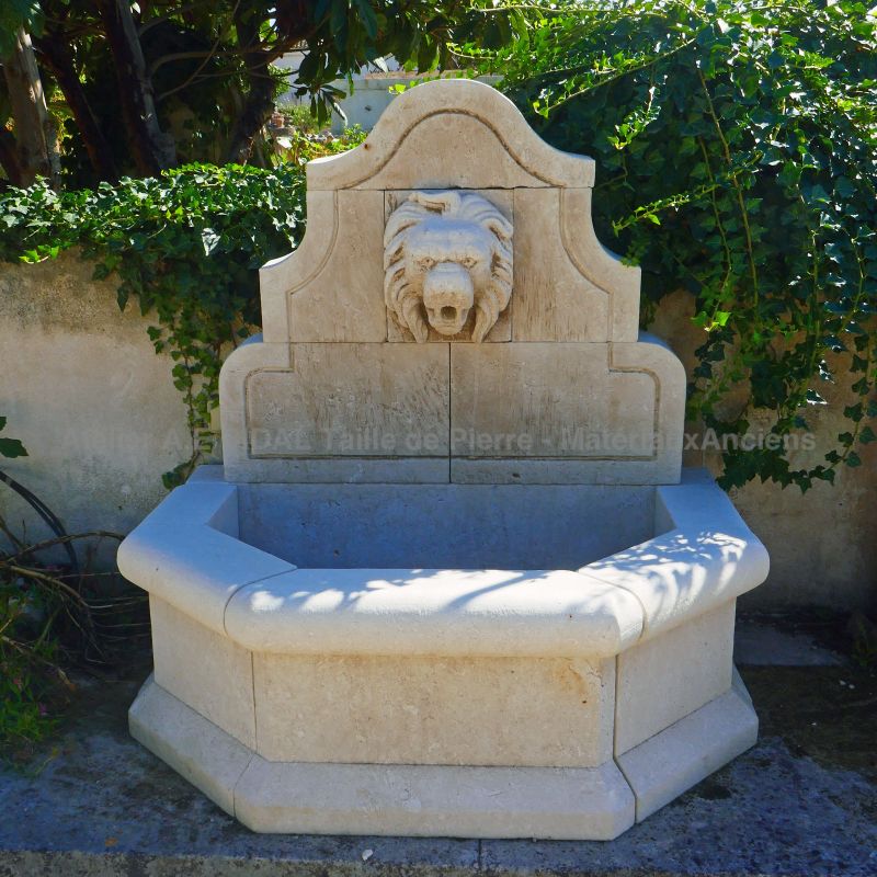 Natural stone fountain with lion's head - Hand-crafted in Provence by Atelier Alain BIDAL
