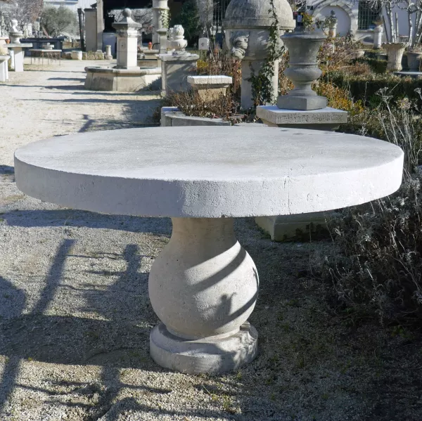 Garden table hand carved in natural French limestone by the master stone cutter of Atelier Alain BIDAL