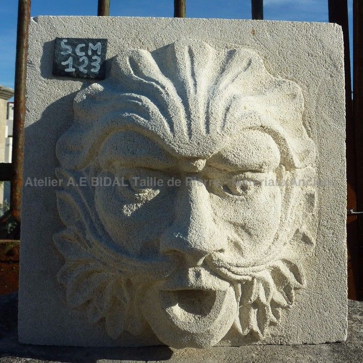Carved water outlet in stone : a nice sculpture by  the stone cutting atelier Alain BIDAL (Provence)