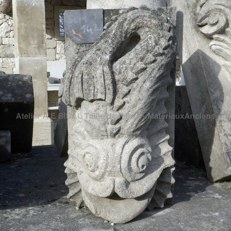 Decorative spitting dolphin as water outlet in carved limestone - Atelier Alain BIDAL (Provence)