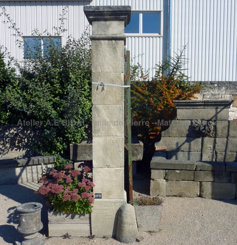 Two assorted pillars in Estaillades stone, a limestone from French quarry.
