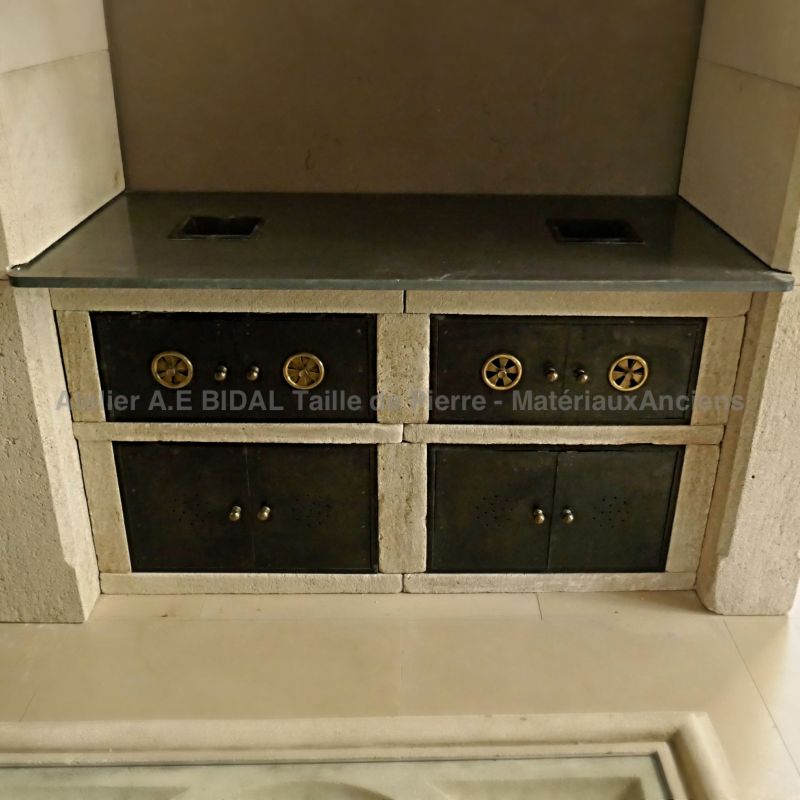 Detail of the old cast iron kitchen on our stone kitchen signed Atelier Alain BIDAL.