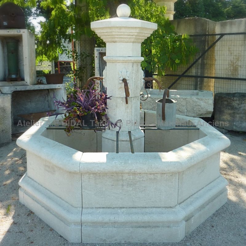 Fontaine de Vaucluse by Alain Bidal in Provence | Central fountain carved in natural French stone.
