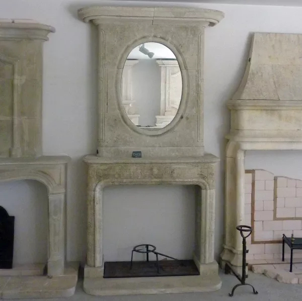 2,7 meters tall fireplace with trumeau hand-crafted in limestone - Atelier Alain BIDAL (Provence)