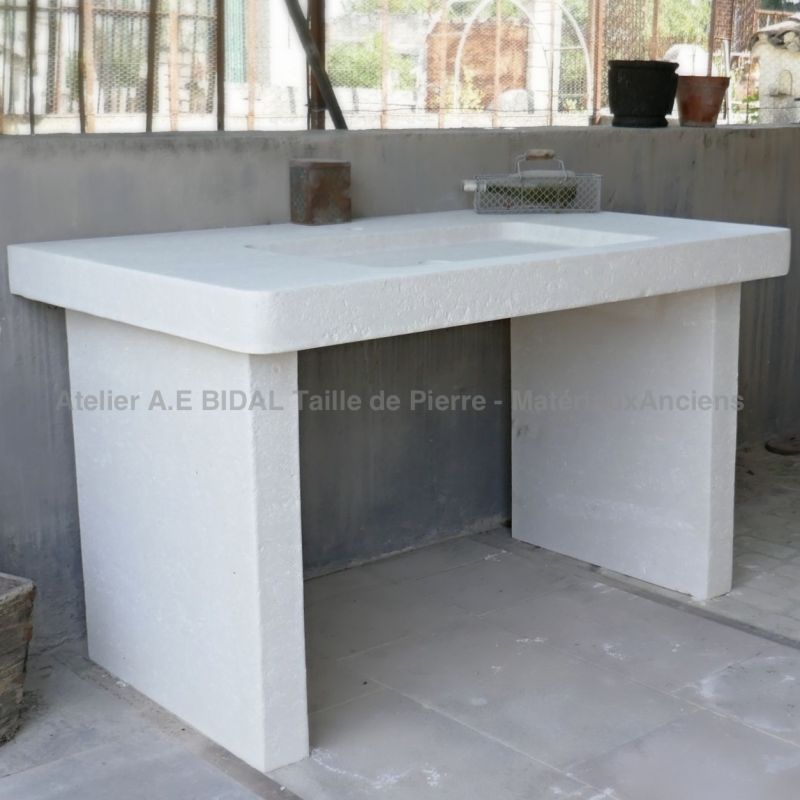 Modern stone sink for stylish kitchen on sale at Atelier Alain Bidal in Provence.